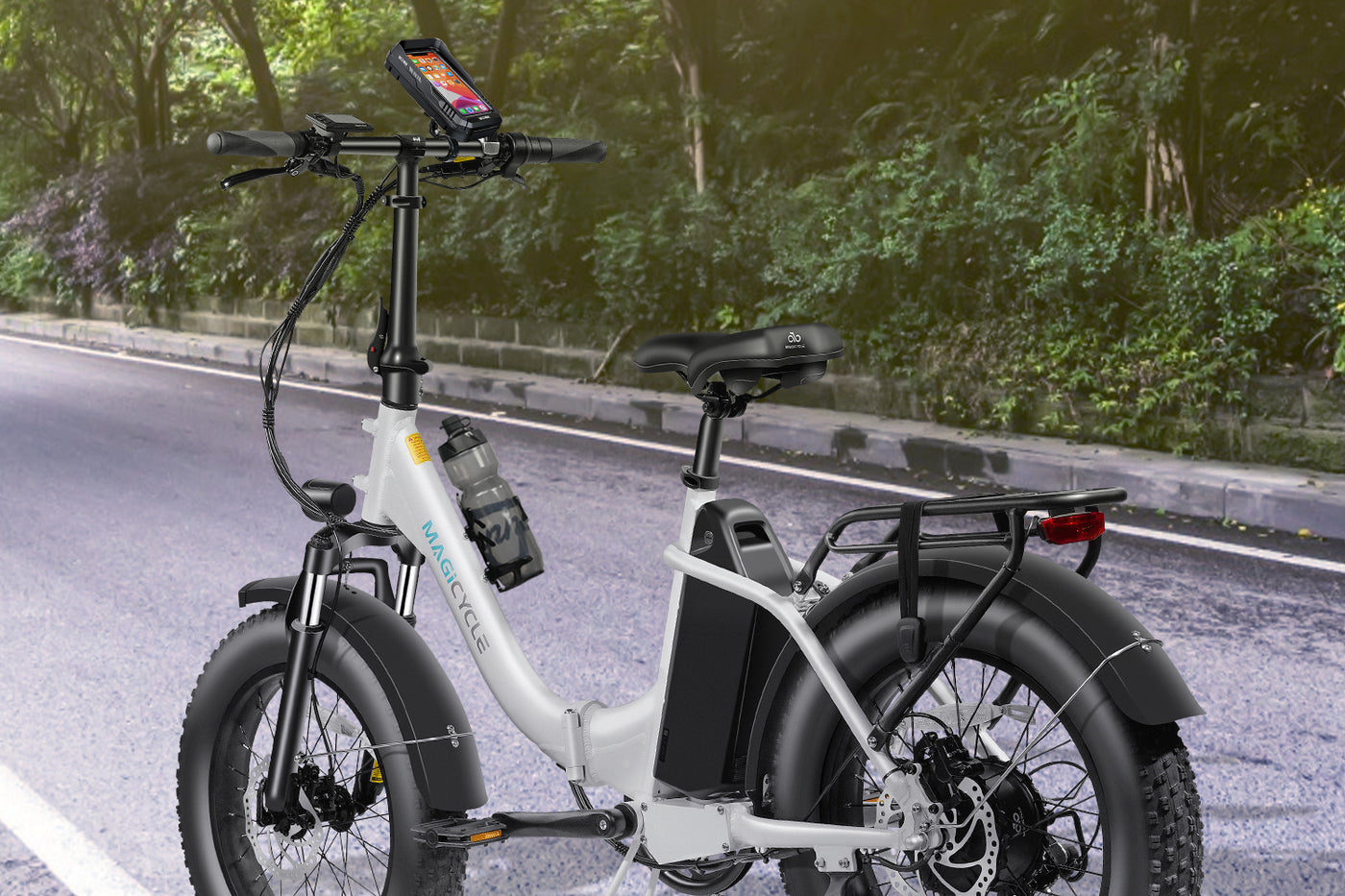 Electric bike with water bottle and phone mount on handlebar.