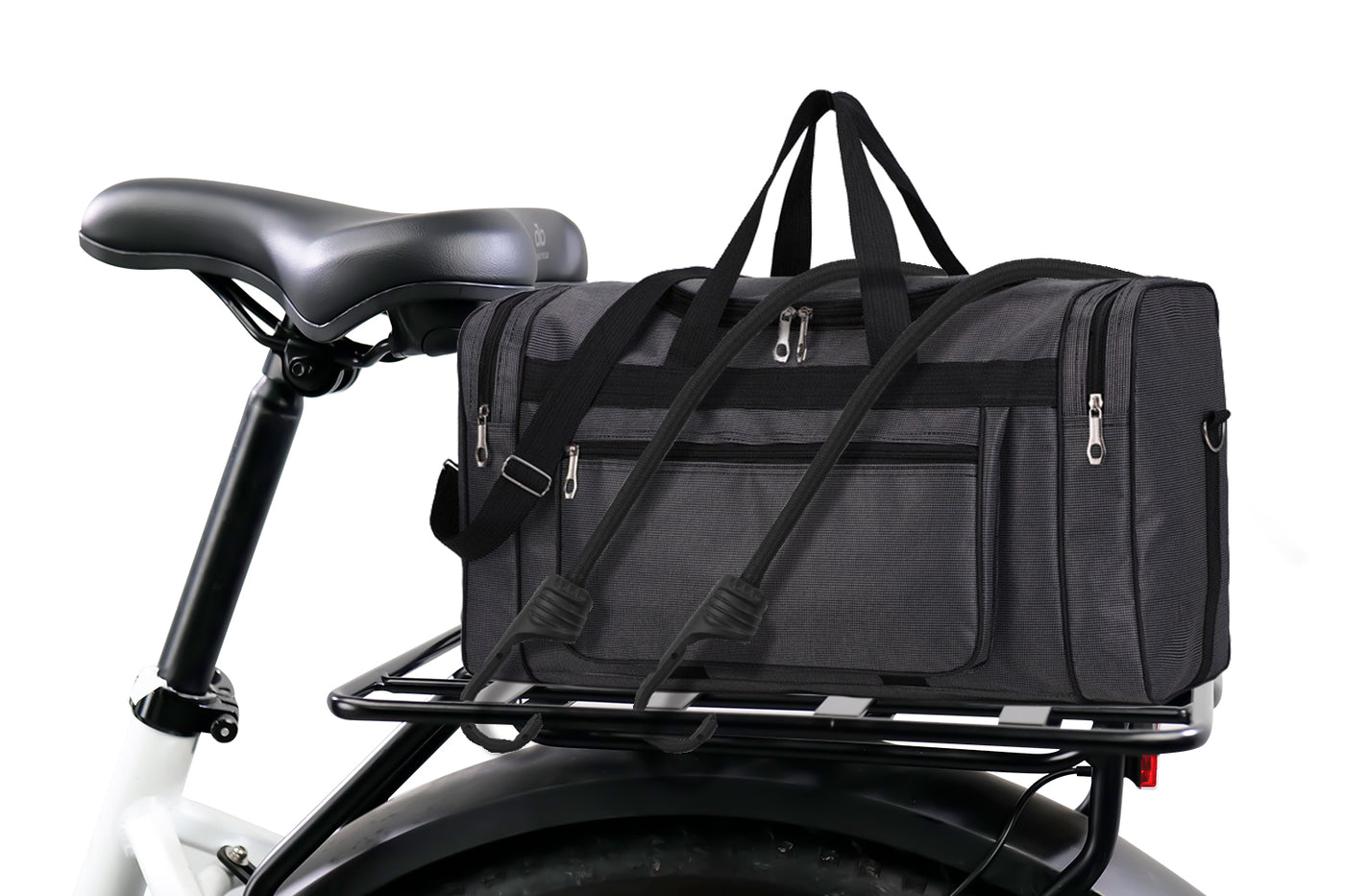 Black duffel bag on aluminum ebike platform rack, demonstrating cargo transport capability.