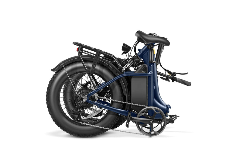 Folding Jaguarundi 2.0 fat tire ebike with blue frame, compact design, ideal for storage.