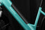 Teal Magicycle CT-1 ebike frame detail showcasing battery area and brand logo.