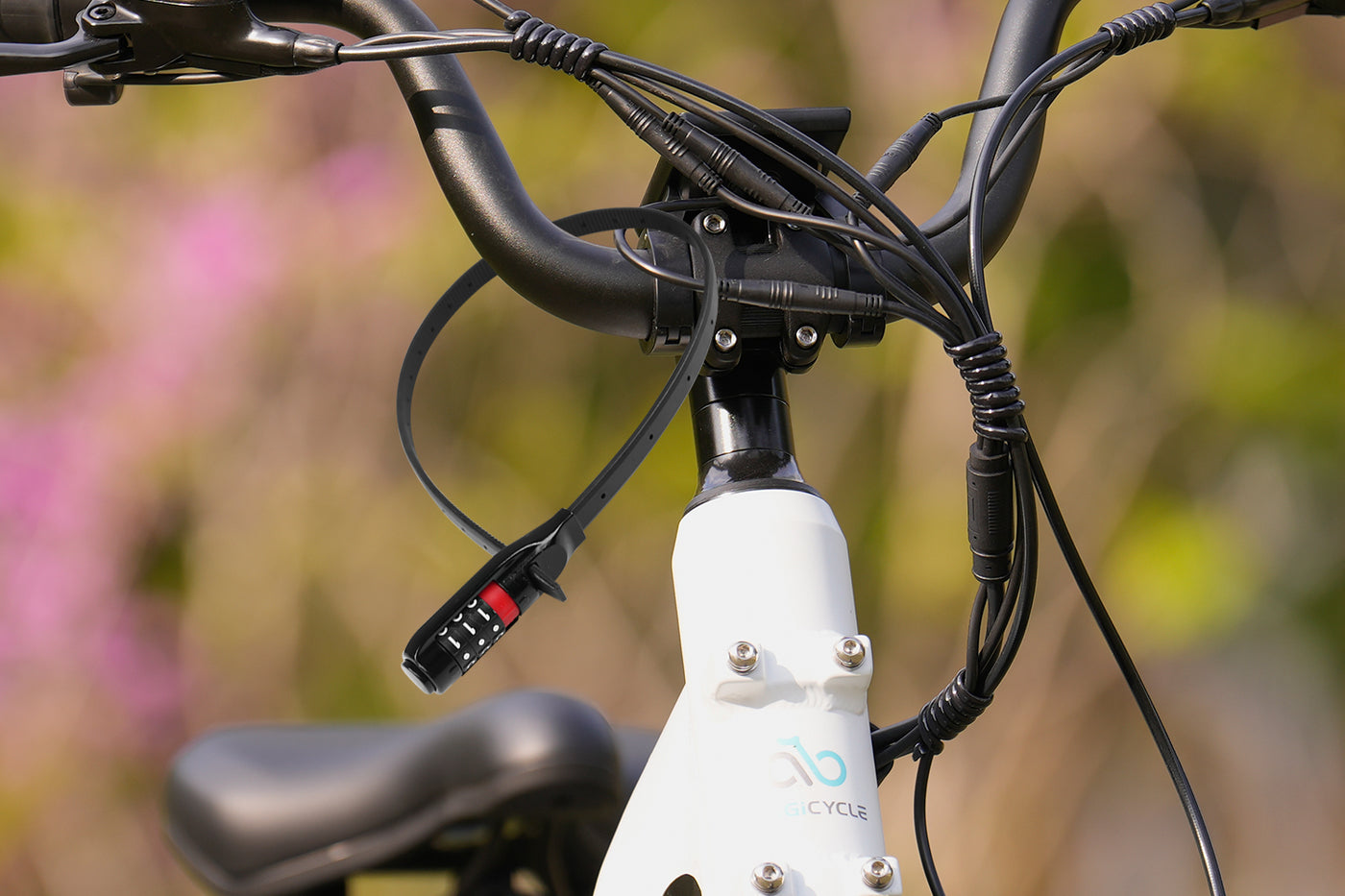 Zip tie helmet lock on Magicycle e-bike handlebar for secure storage.